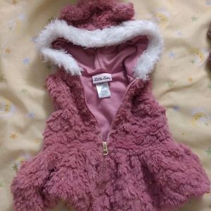 Pink fuzzy vest jacket.